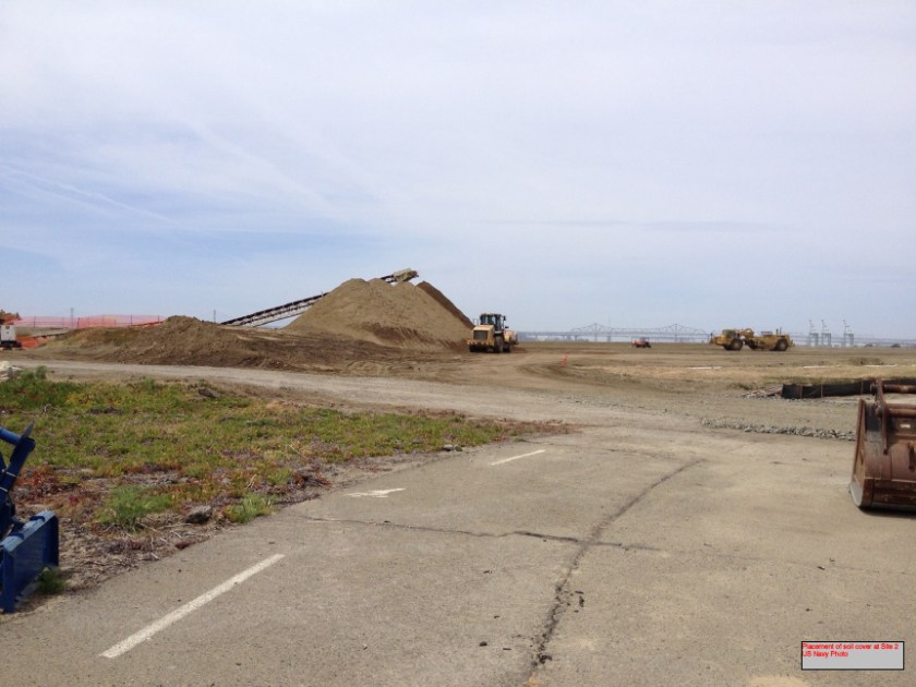 Placement of soil cover at Site 2 - May 2013.  US Navy Photo.