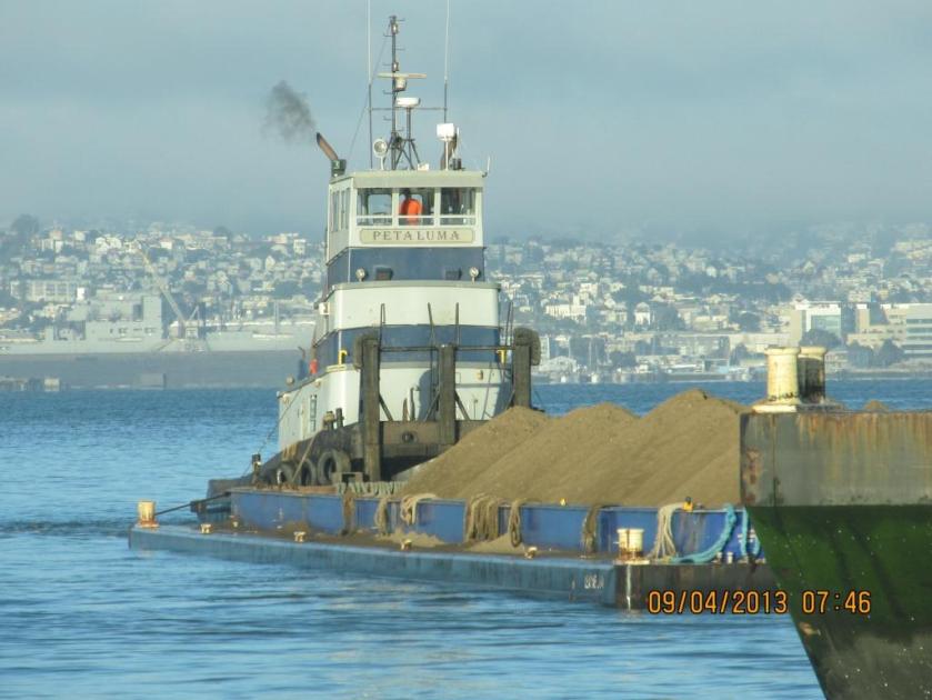 Soil being delivered from Decker Island.