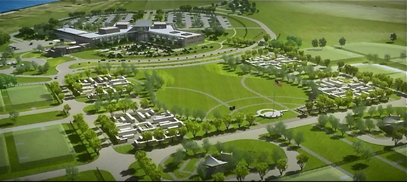 Columbarium in foreground, clinic/office building in background.  Looking east, with Oakland Estuary on left.