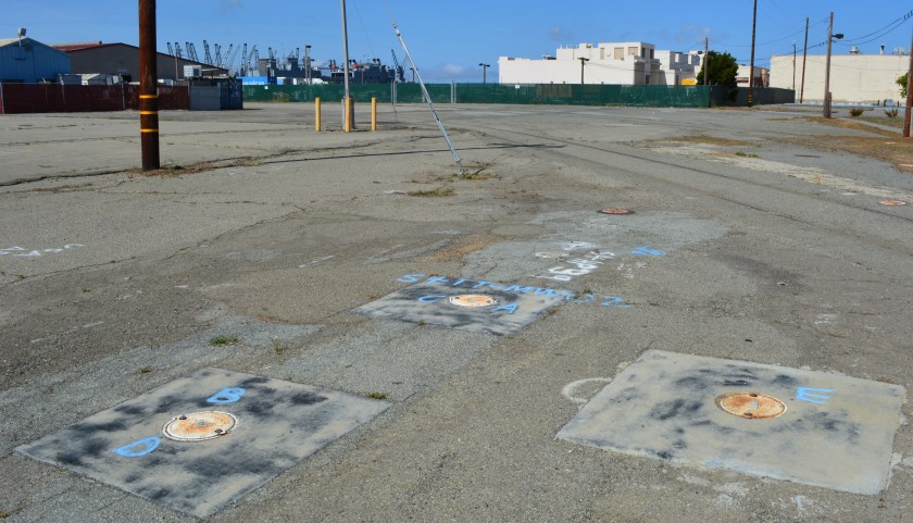 Groundwater cleanup area on OU-2B.  Cleanup will not be completed until 2020.  Looking west with maritime ships in background in Seaplane Lagoon.