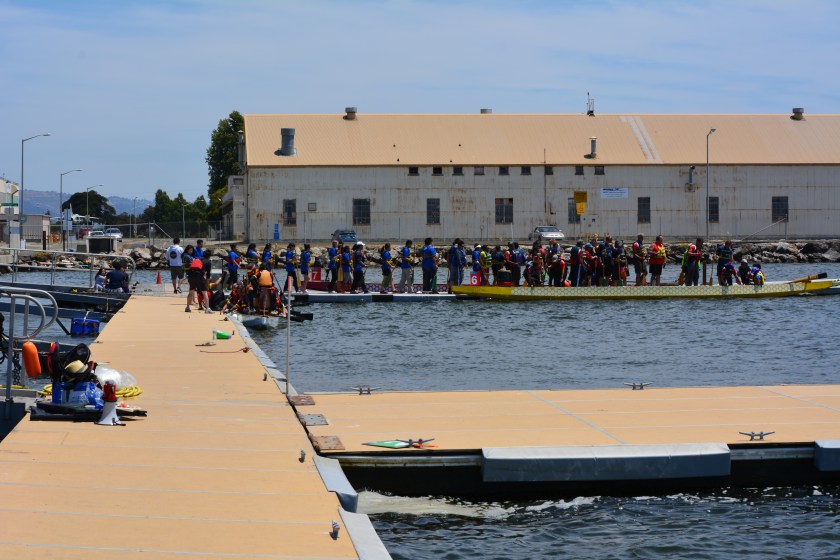 Dragon boaters on Seaplane Lagoon boating dock