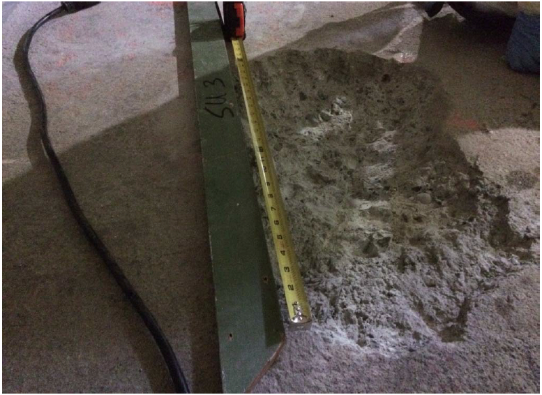 Area of floor in Building 400 where radium-226 contamination was found and removed. Navy photo.