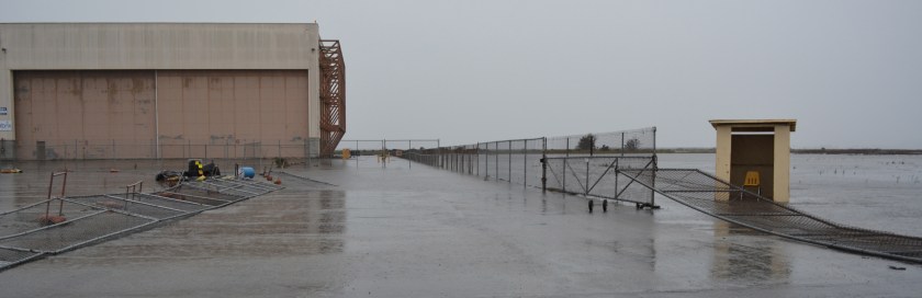 Building 25 and the Runway Wetland are in the background.   VA property begins on the right.