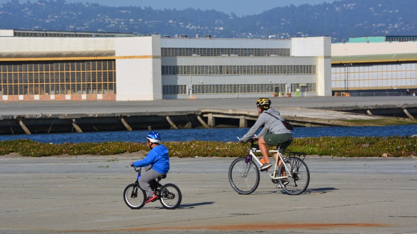 Mother and son cycling on west side of Seaplane Lagoon.