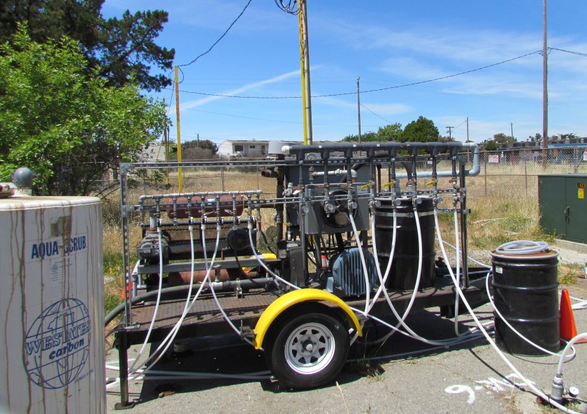 Air injection and vapor extraction system operating at former commissary gas station site in May 2013. Charcoal tank to capture vapors is at left.
