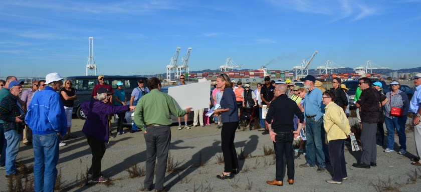 Jennifer Ott answering questions at the western shoreline. This location is where the VA's future road will end, with a small parking lot, benches, and access to the Bay Trail.
