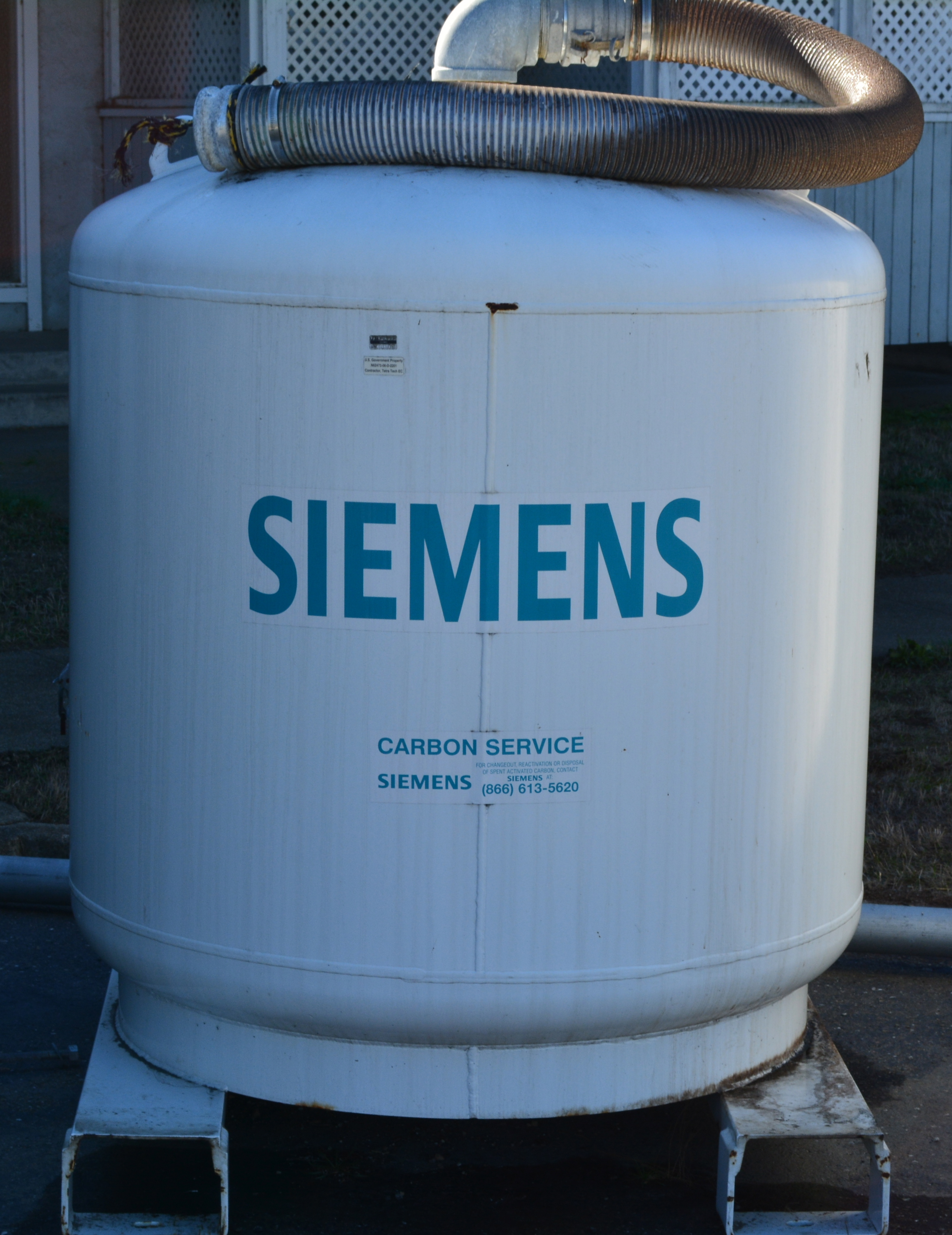 Charcoal filter tank to remove benzene and naphthalene from groundwater vapors, waiting to be hauled away.